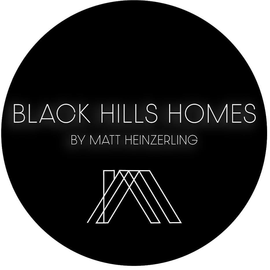 Black Hills Homes by Matt Heinzerling logo featuring modern white linework forming a stylized roof shape on a black circular background.